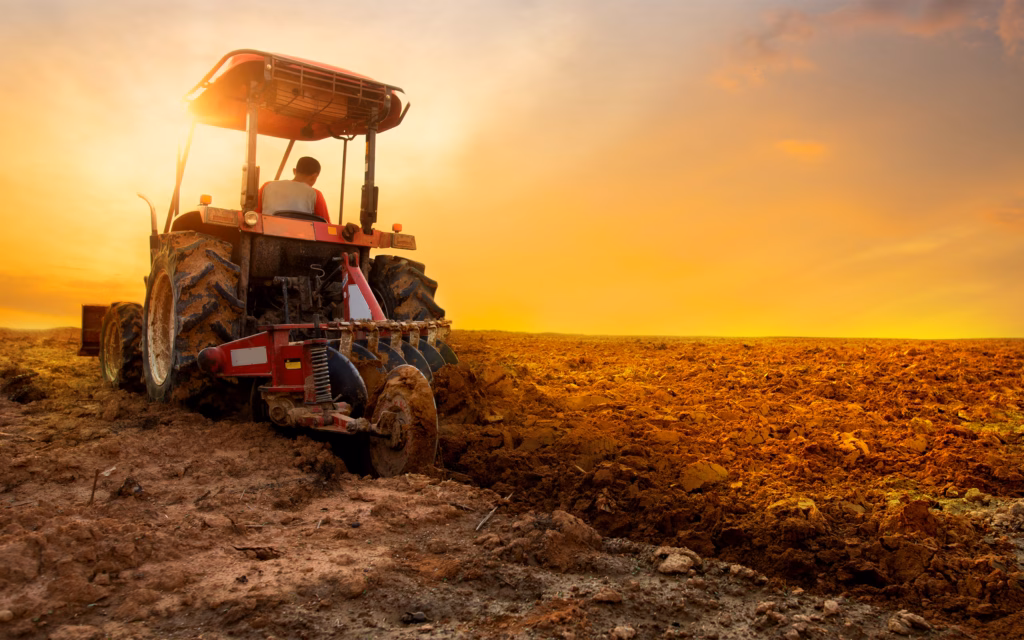 Tractor Tilling Field